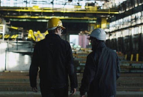 cropped-03_60_15_Two_Workers_Back_Industrial_Environment-1.jpg Agencja Pracy EAST2WEST